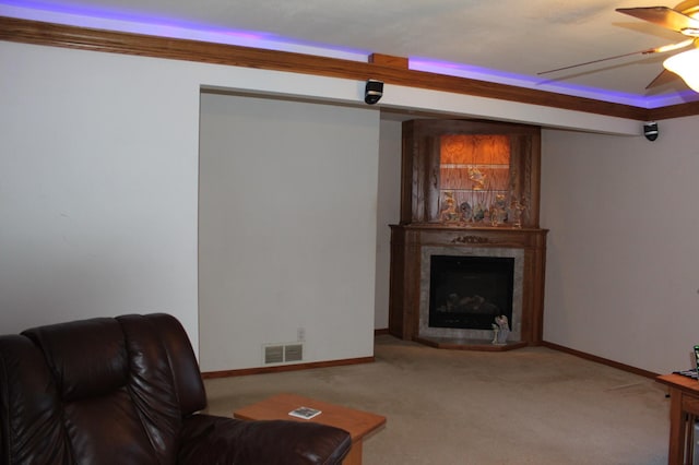 1803 214th Ave NE, East Bethel, MN 55011 - carpeted living area featuring ceiling fan and a fireplace
