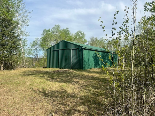 19997 Stockyard Rd, Bagley, MN 56621 - view of pole building with a lawn