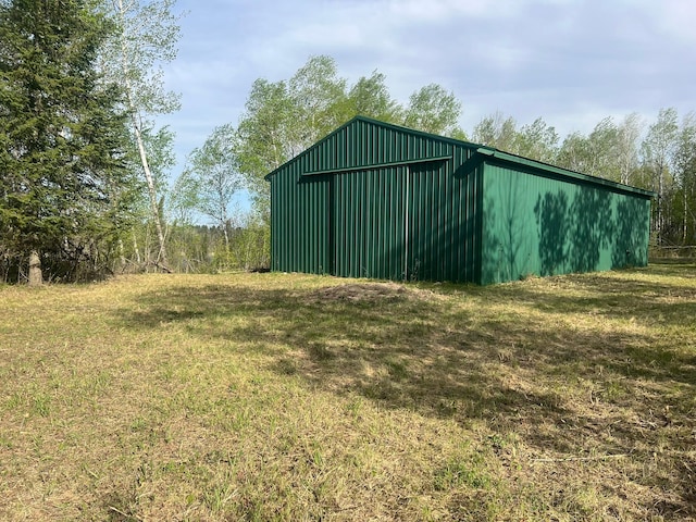 19997 Stockyard Rd, Bagley, MN 56621 - view of pole building featuring a lawn