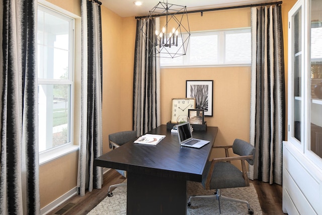 1165 Woods Creek Dr S, Delano, MN 55328 - home office with wood finished floors, healthy amount of natural light, and a chandelier