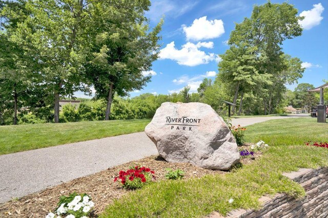 1165 Woods Creek Dr S, Delano, MN 55328 - community / neighborhood sign with a yard