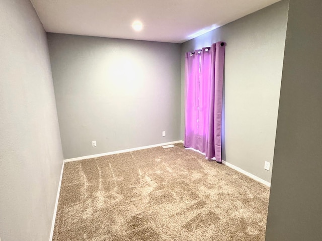424 2nd St N, Greenbush, MN 56726 - spare room featuring carpet and baseboards
