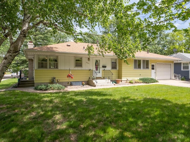 3401 Yukon Ave S, Saint Louis Park, MN 55426 - ranch-style house with an attached garage, concrete driveway, a front lawn, and a chimney