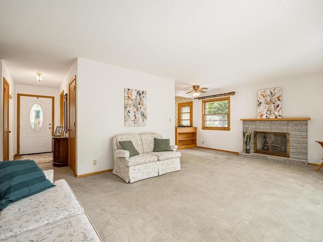 3401 Yukon Ave S, Saint Louis Park, MN 55426 - living room with carpet floors, baseboards, a stone fireplace, and ceiling fan