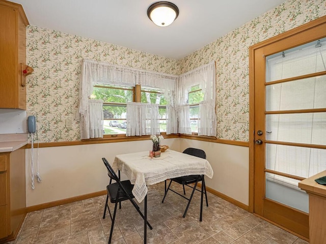 3401 Yukon Ave S, Saint Louis Park, MN 55426 - dining area with wallpapered walls, plenty of natural light, and baseboards