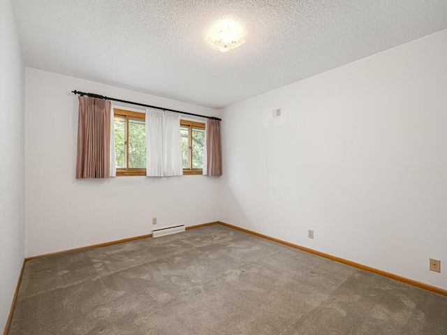 3401 Yukon Ave S, Saint Louis Park, MN 55426 - carpeted spare room with a baseboard radiator, baseboards, and a textured ceiling