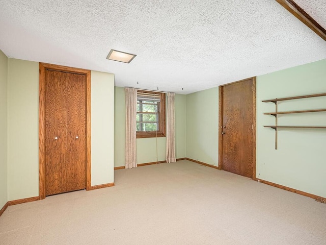 3401 Yukon Ave S, Saint Louis Park, MN 55426 - unfurnished bedroom featuring baseboards, carpet, and a textured ceiling