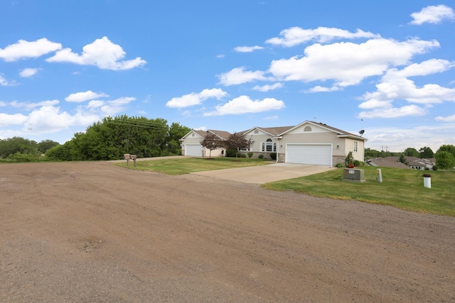 2245 198th St W, Faribault, MN 55021 - view of front of home with driveway, a front lawn, and an attached garage