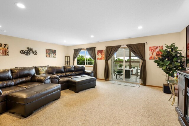 2245 198th St W, Faribault, MN 55021 - living room featuring light colored carpet, recessed lighting, and baseboards
