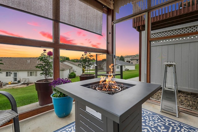 2245 198th St W, Faribault, MN 55021 - patio terrace at dusk featuring an outdoor fire pit