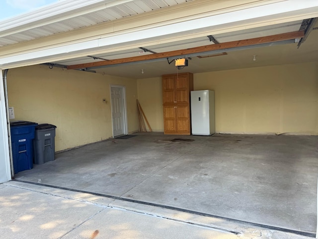 446 30th St N, Moorhead, MN 56560 - garage featuring a garage door opener