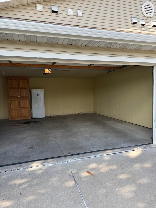 446 30th St N, Moorhead, MN 56560 - garage featuring a garage door opener