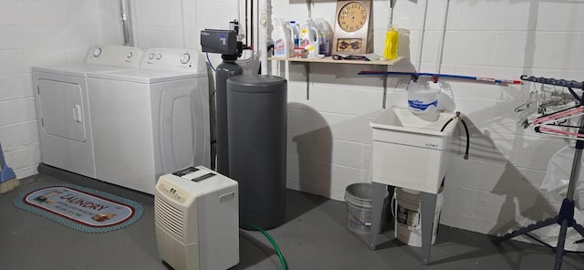 114 6th Ave, Albert Lea, MN 56007 - washroom with separate washer and dryer and concrete block wall