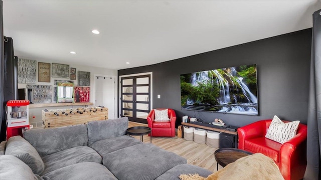 living room featuring wood finished floors and recessed lighting