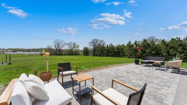 view of patio / terrace with an outdoor hangout area and a water view