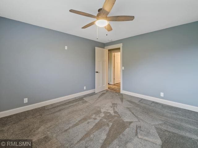 1706 57th Ave, Hammond, WI 54015 - carpeted spare room with a ceiling fan and baseboards
