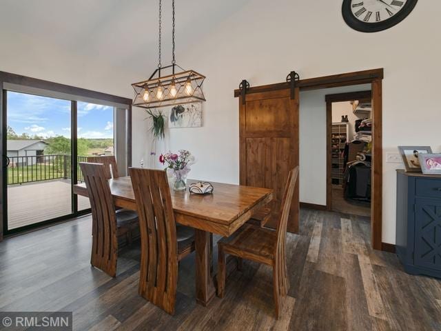 1706 57th Ave, Hammond, WI 54015 - dining area featuring dark wood-style flooring and a barn door