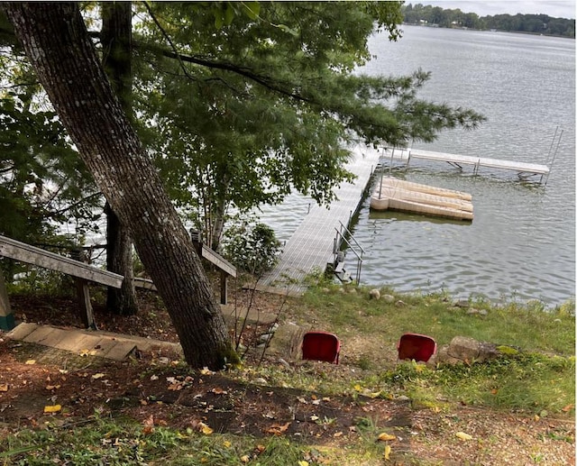 dock area featuring a water view