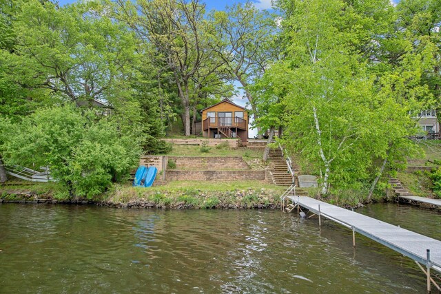 22718 Martin Lake Dr NE, Linwood Twp, MN 55092 - dock area featuring stairs and a deck with water view