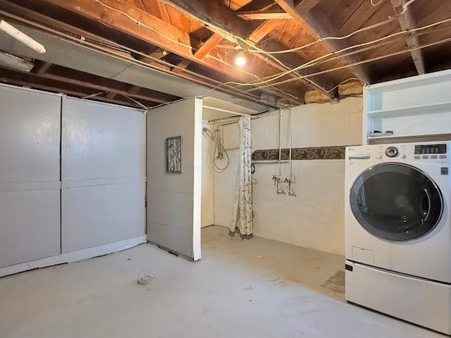 306 Blinkman St, Fairmont, MN 56031 - unfinished below grade area featuring washer / dryer
