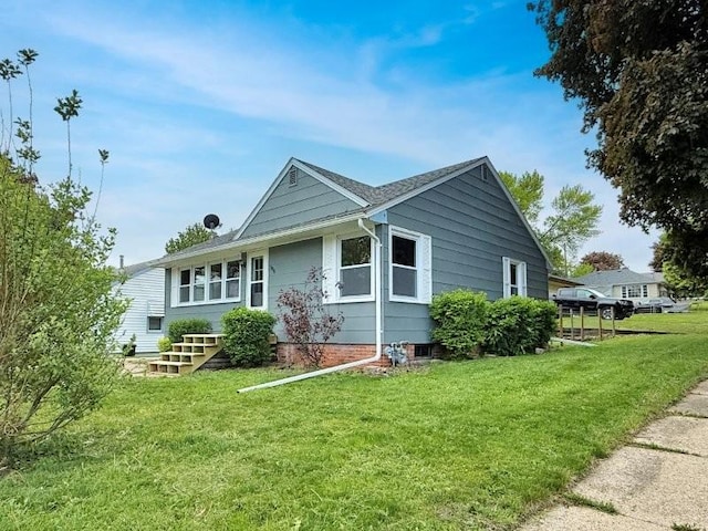 306 Blinkman St, Fairmont, MN 56031 - view of property exterior featuring a lawn