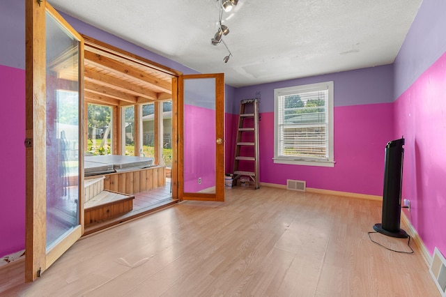 1391 Main St, Saint Joseph Twp, WI 54082 - interior space featuring wood finished floors and a textured ceiling