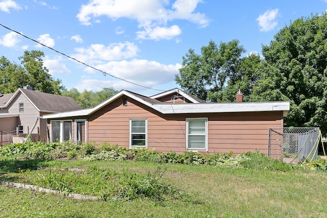 1391 Main St, Saint Joseph Twp, WI 54082 - view of property exterior with a chimney