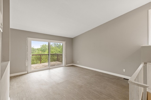 6007 Covington Ter, Minnetonka, MN 55345 - unfurnished room featuring baseboards and wood finished floors