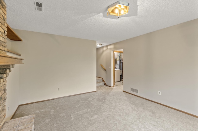 6007 Covington Ter, Minnetonka, MN 55345 - unfurnished living room with a fireplace, stairs, light carpet, a textured ceiling, and baseboards