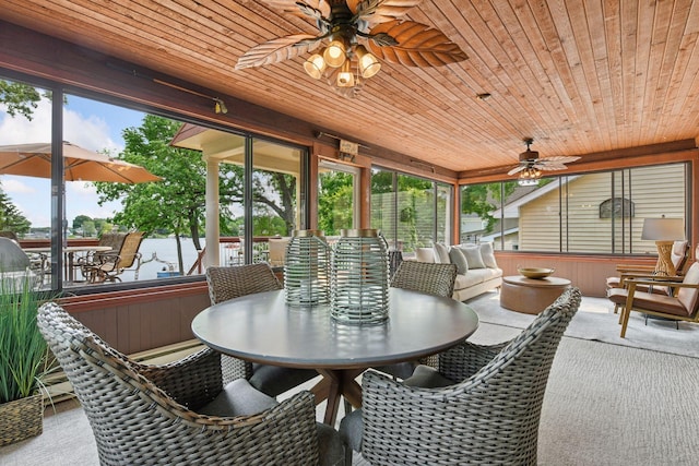 2452 Black Lake Rd, Spring Park, MN 55384 - sunroom featuring ceiling fan, outdoor dining area, wooden ceiling, and healthy amount of natural light