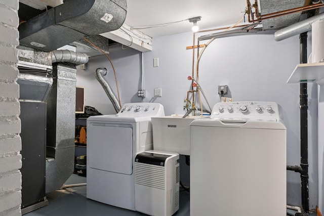 2452 Black Lake Rd, Spring Park, MN 55384 - laundry room featuring independent washer and dryer and heating unit