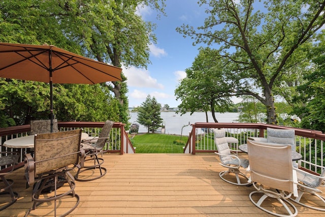 2452 Black Lake Rd, Spring Park, MN 55384 - wooden terrace with outdoor dining space and a water view