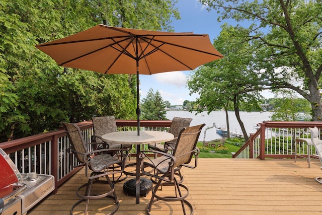 2452 Black Lake Rd, Spring Park, MN 55384 - deck featuring outdoor dining space and a water view