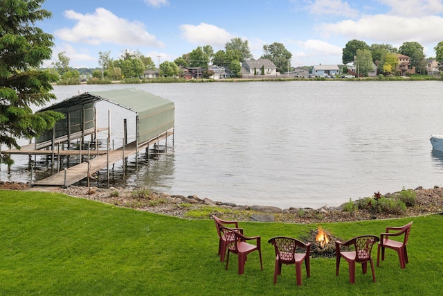 2452 Black Lake Rd, Spring Park, MN 55384 - dock area featuring a water view, a fire pit, boat lift, and a yard