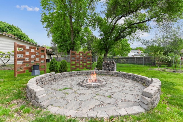 view of patio / terrace with an outdoor fire pit