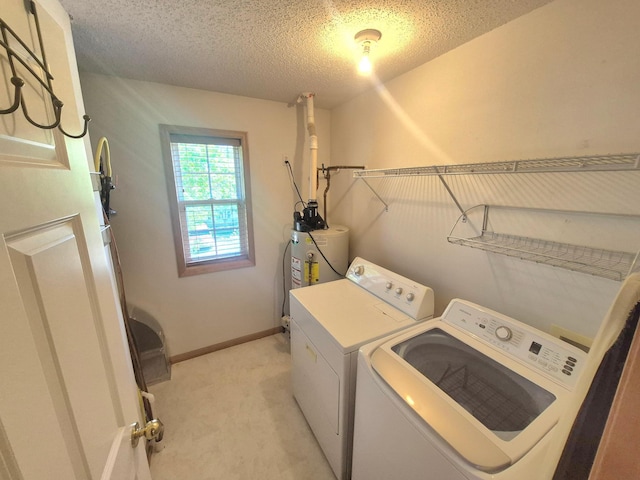 15437 Frost Path Unit 1507, Apple Valley, MN 55124 - clothes washing area featuring water heater, light carpet, washing machine and clothes dryer, a textured ceiling, and baseboards