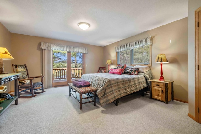 14464 Grouse Ln, Fifty Lakes, MN 56448 - bedroom with light colored carpet and access to outside