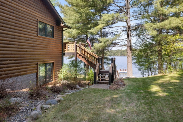 14464 Grouse Ln, Fifty Lakes, MN 56448 - view of green lawn with stairs and a deck with water view