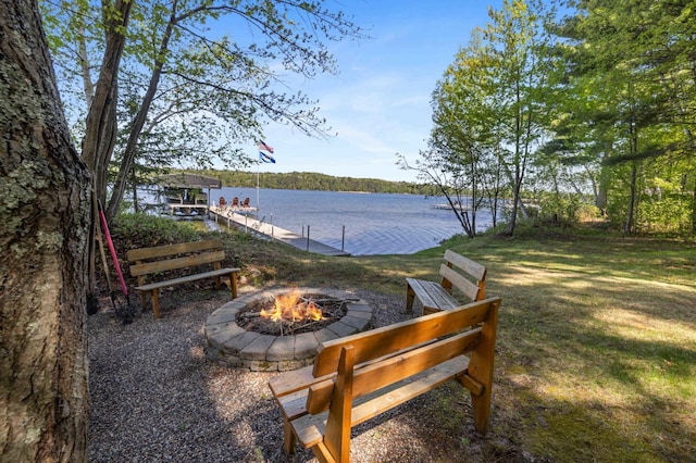 14464 Grouse Ln, Fifty Lakes, MN 56448 - view of yard with a fire pit, a water view, and a boat dock