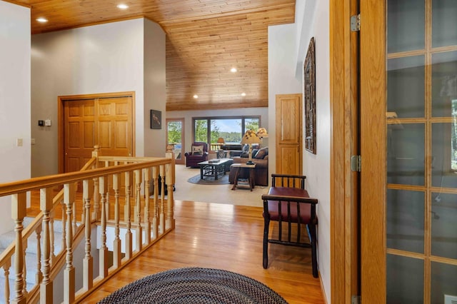 14464 Grouse Ln, Fifty Lakes, MN 56448 - hallway featuring wood ceiling, an upstairs landing, wood finished floors, recessed lighting, and high vaulted ceiling