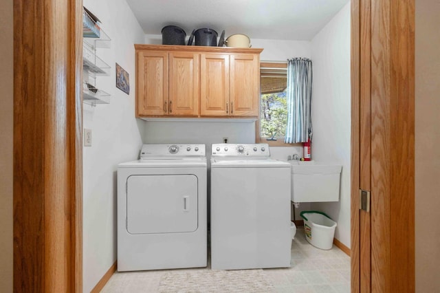 14464 Grouse Ln, Fifty Lakes, MN 56448 - laundry area with separate washer and dryer and cabinet space