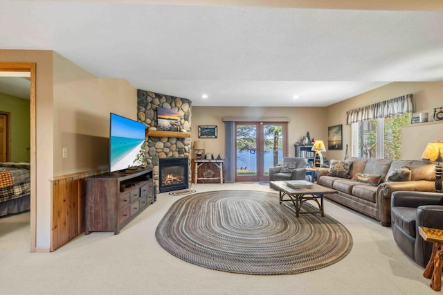 14464 Grouse Ln, Fifty Lakes, MN 56448 - living room featuring light carpet, a fireplace, and recessed lighting