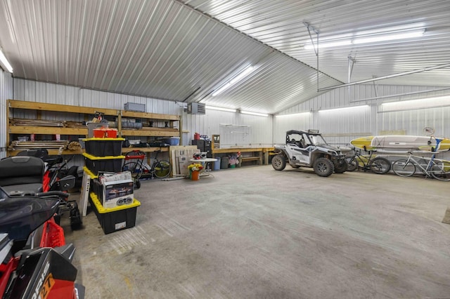 14464 Grouse Ln, Fifty Lakes, MN 56448 - garage with a garage door opener and metal wall