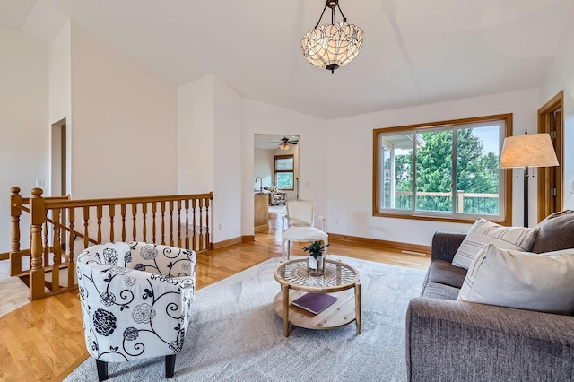 13546 Maryland Ave, Savage, MN 55378 - living room with light wood-style floors, vaulted ceiling, and a ceiling fan