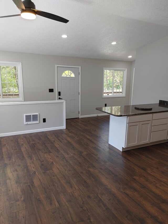 3245 Laketown Rd, Sturgeon Lake, MN 55783 - kitchen featuring open floor plan, ceiling fan, dark wood finished floors, recessed lighting, and baseboards