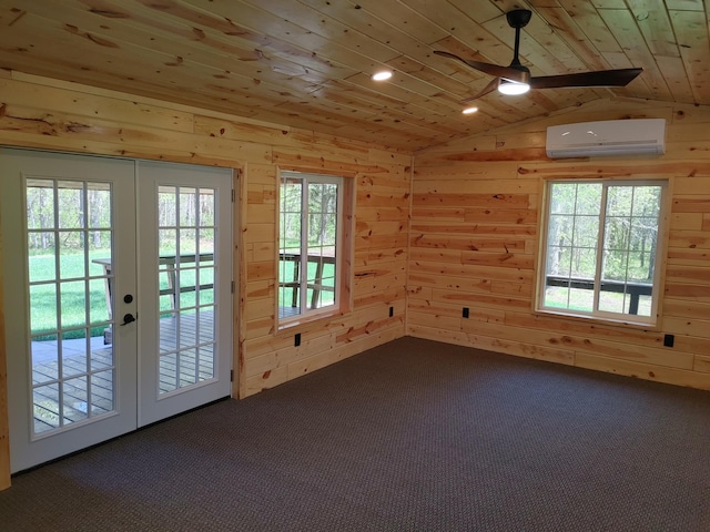 3245 Laketown Rd, Sturgeon Lake, MN 55783 - unfurnished room featuring a wall unit AC, dark colored carpet, wooden ceiling, french doors, and lofted ceiling