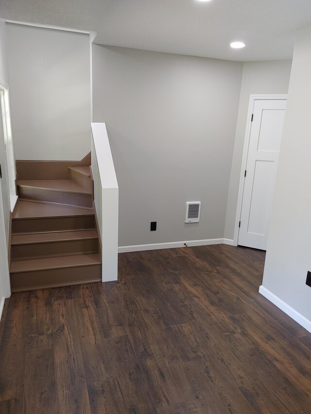 3245 Laketown Rd, Sturgeon Lake, MN 55783 - stairway with wood finished floors, baseboards, and recessed lighting