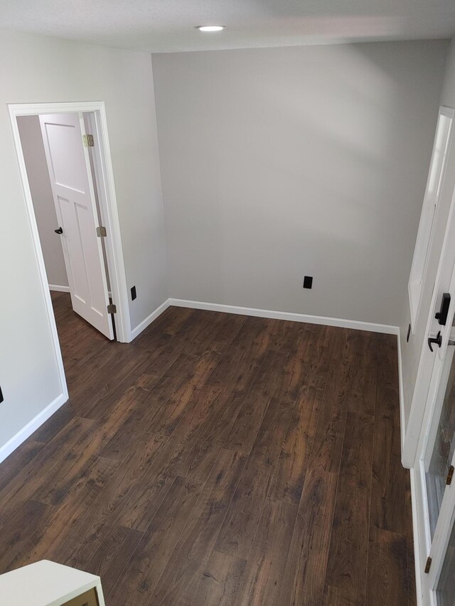 3245 Laketown Rd, Sturgeon Lake, MN 55783 - empty room with baseboards and dark wood finished floors