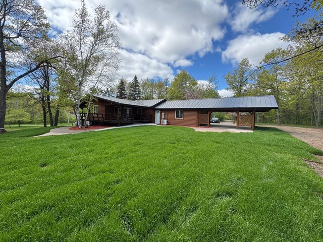 3245 Laketown Rd, Sturgeon Lake, MN 55783 - view of front of house with a front yard and metal roof