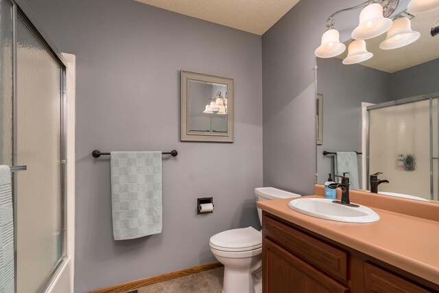 45 Restless Ct Unit 101, North Mankato, MN 56003 - full bathroom with an enclosed shower, toilet, vanity, a chandelier, and baseboards